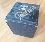 The side that slides open.